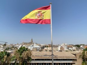 A flag waves in the wind outside