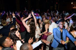 Students in formal attire dance