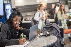 Student working in Joe's Coffee