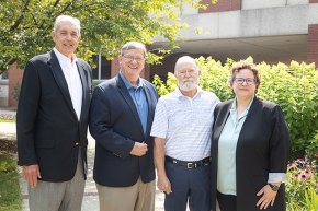 Andy Anderson, Fred Whitt, Robert Fritz and Jennifer Burris together on campus