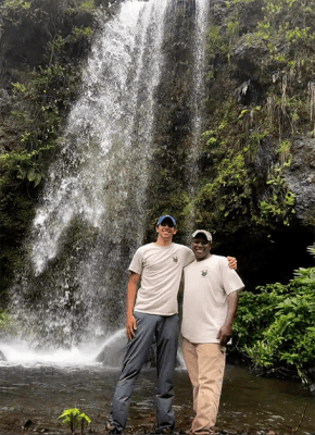 Harrison Hickman with friend at a waterfall