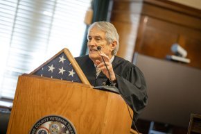 Judge Marvin Pope at podium in Veterans Treatment Court of Buncombe County