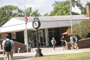 Students walk to the Cromer Center across Shaw Plaza 