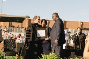 Omari Alexander's parents accept a posthumous bachelor's degree on behalf of their son
