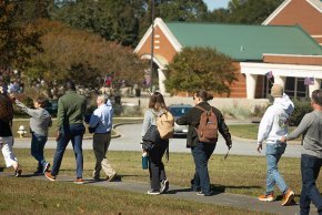 A long line of voters in front of the polling place at Highland Recreation center