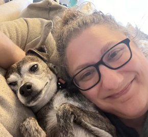 Kat Heiden and her dog in close-up