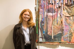 Meredith Cecil stands with her multimedia work in the Hickory Museum of Art