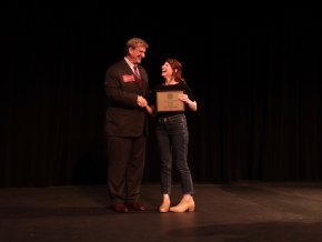 Left, Dr. Fred Whitt, shakes hands with Dr. Carly York, on right