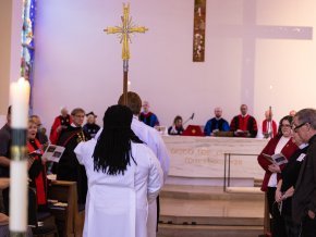 Procession with the cross into Christ Chapel 