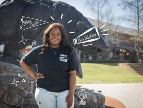 Zaniya Parks wears a Bears Give Back t-shirt in front of the charge